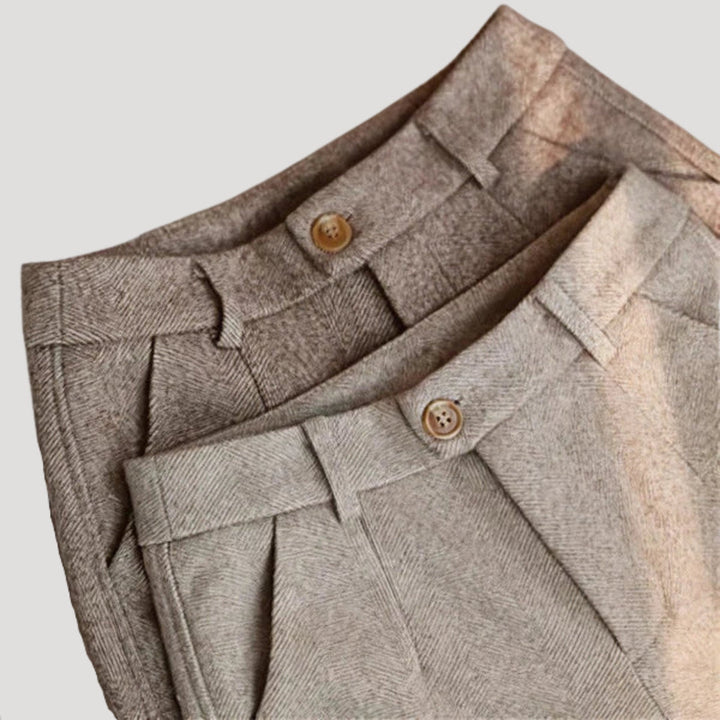 Men's tailored ankle-length smart-casual pants in a classic navy blue, perfect for springwear