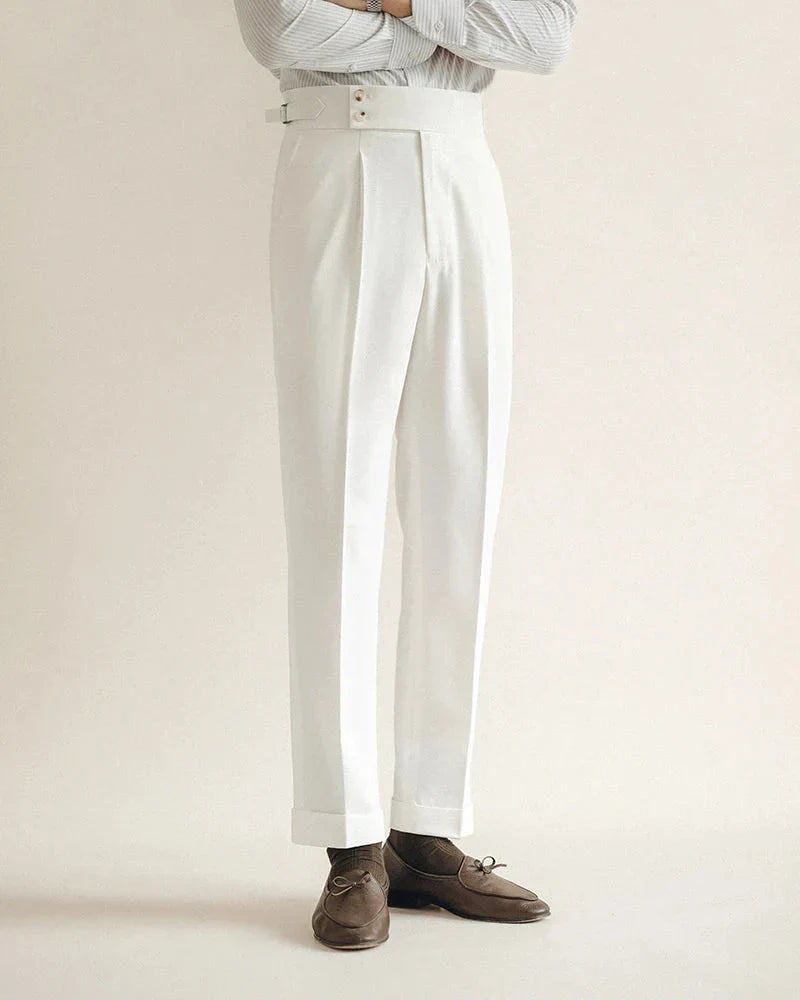 Elastic waistband detail on men's tailored black business trousers, ensuring a comfortable fit.