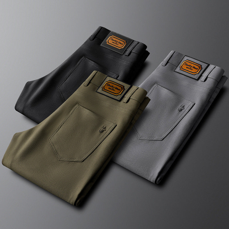 Model wearing army green tailored casual trousers, versatile for formal or smart casual occasions