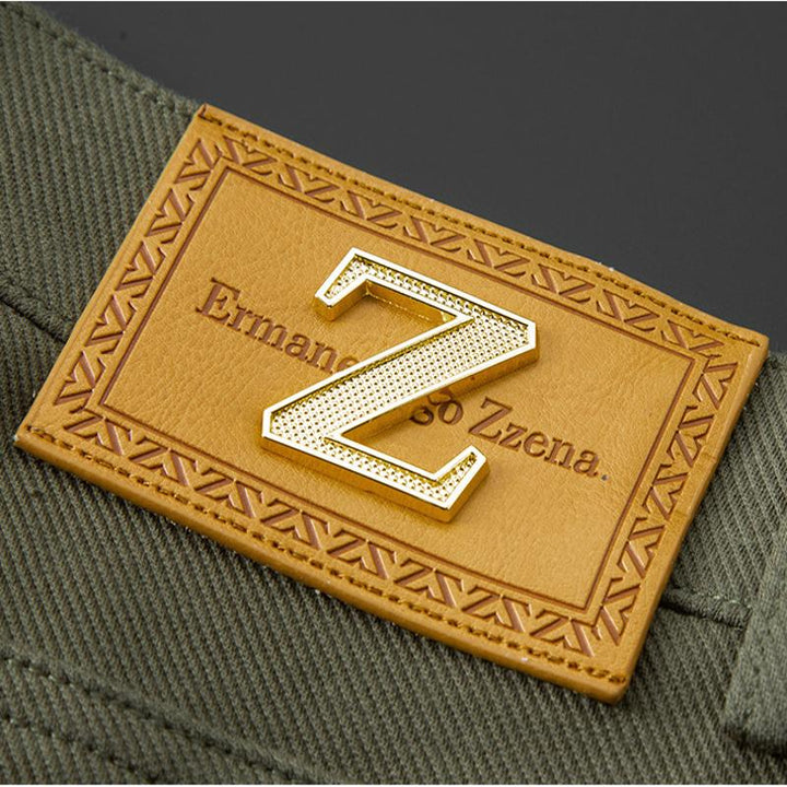Men's casual pants: green tailored stretch denim jeans, ideal for everyday comfort and fashion.
