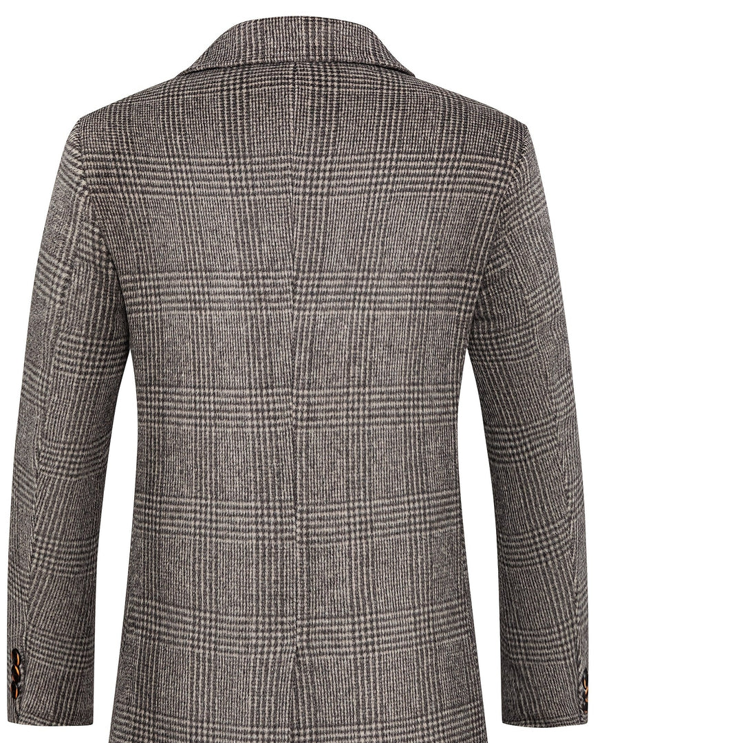 Close-up of khaki plaid fabric on a men's wool blend overcoat, showcasing texture and pattern