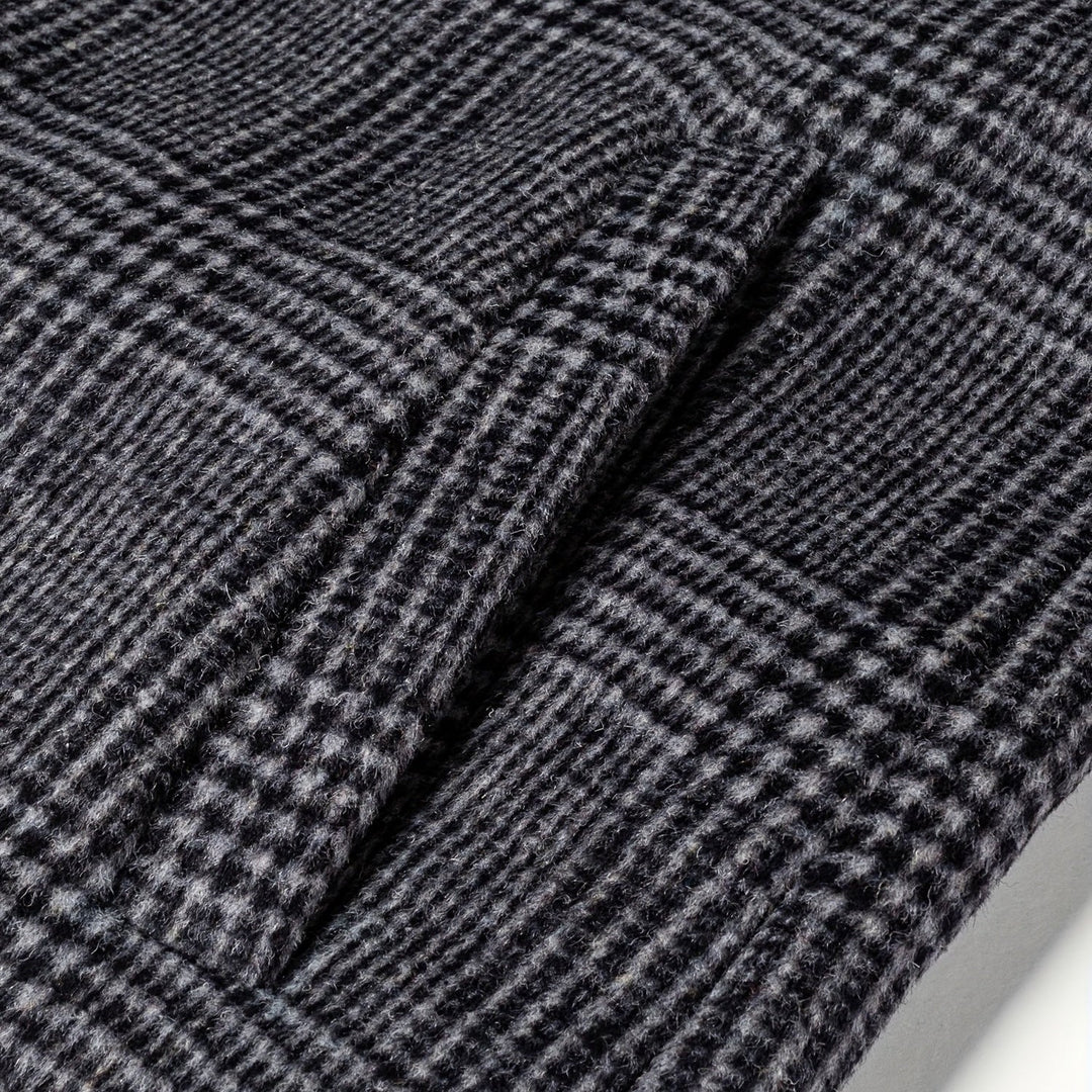 Back view of a men's plaid wool blend overcoat, showcasing the tailored fit and quality fabric