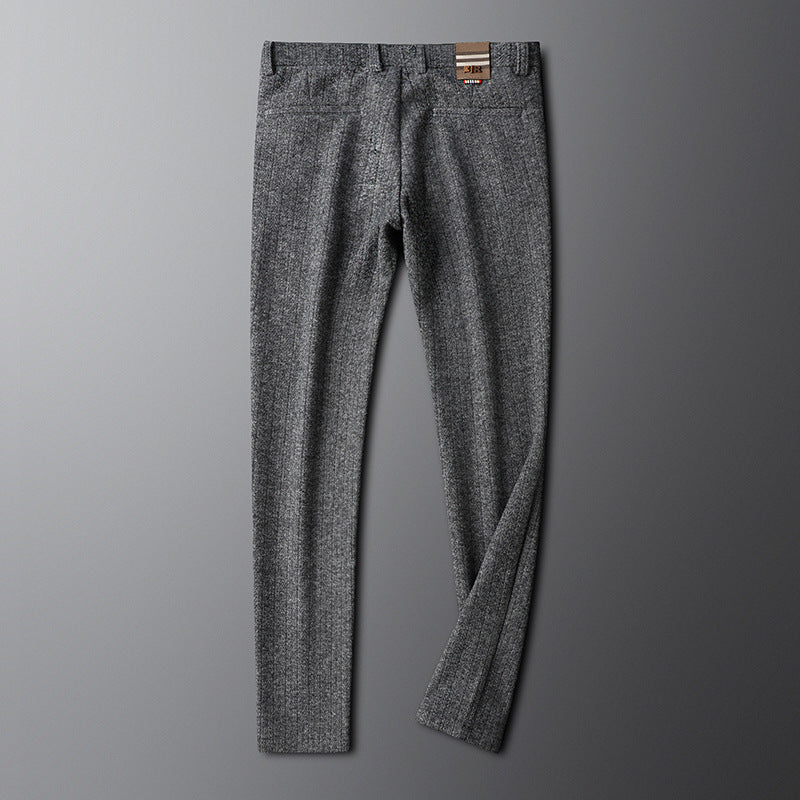 Tailored brown dress pants for men, suitable for both formal and smart casual ensembles.