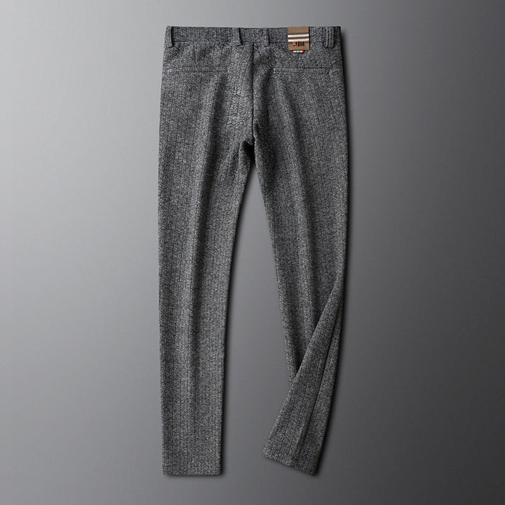 Tailored brown dress pants for men, suitable for both formal and smart casual ensembles.