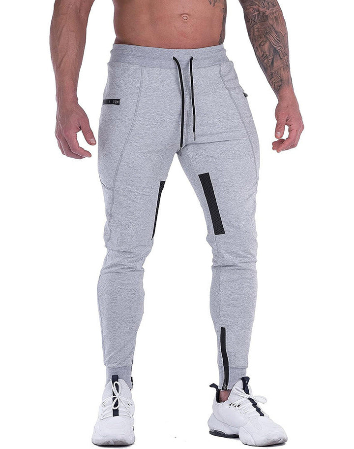 Flat lay of men's tapered athletic joggers, ready for shipping or display