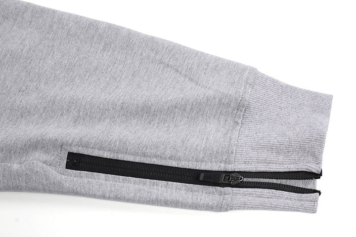 Detail of stitching on men's tapered casual wear joggers, durable athletic pants