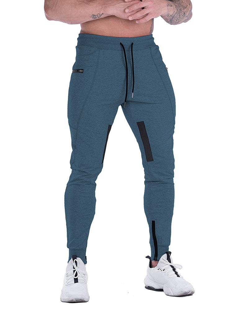 Side view of men's performance tapered joggers, track pants for activewear