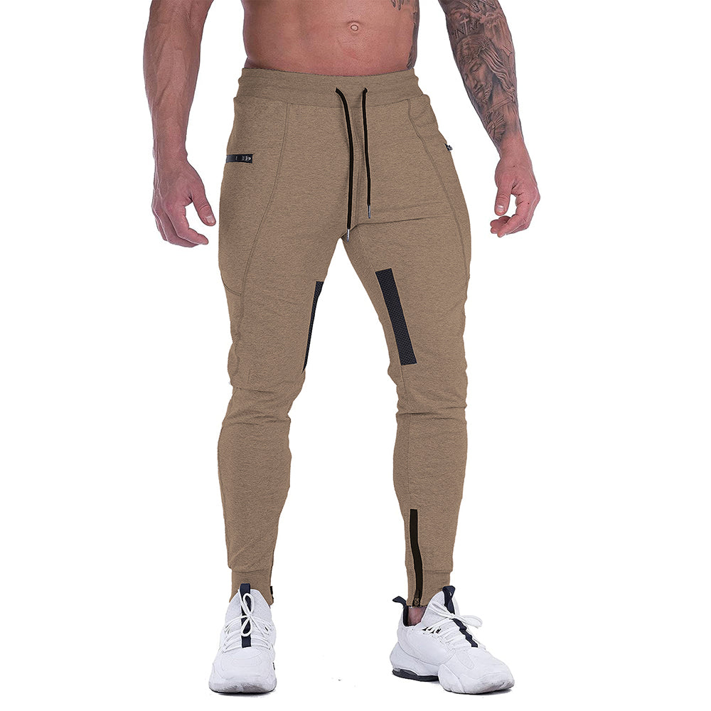 Detail of ankle cuff on men's tapered athletic joggers, showing modern fit