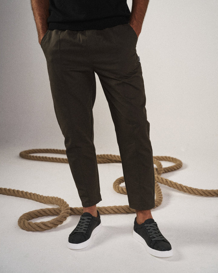 Back view of men's tapered joggers, featuring a comfortable and versatile casual wear style.