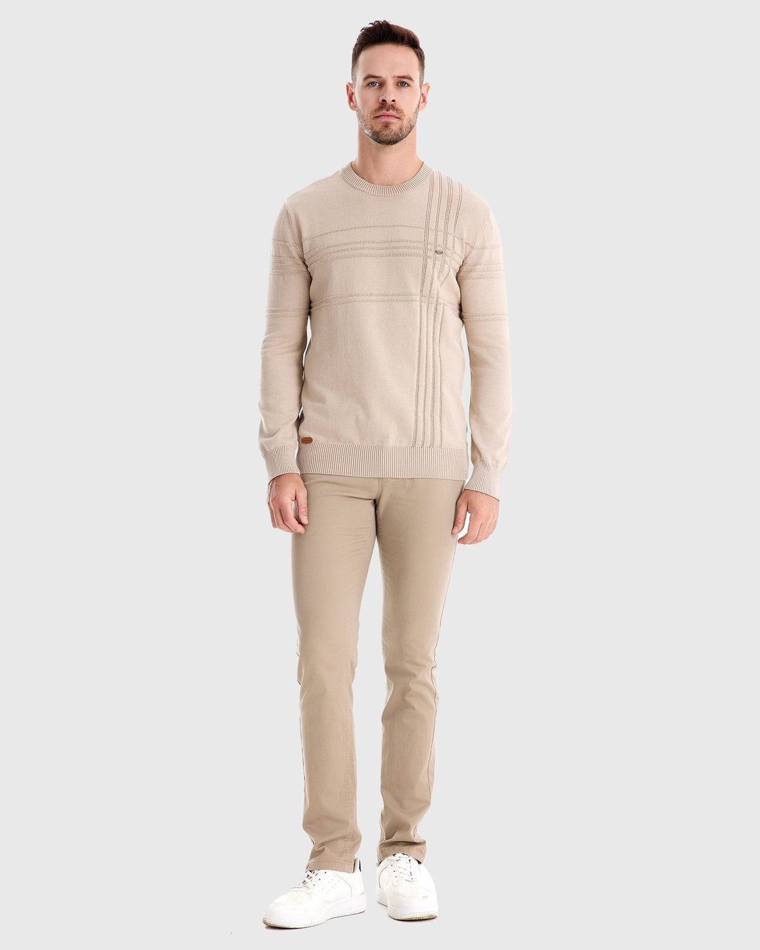 Close-up of the stitching and craftsmanship on a men's premium knit sweater