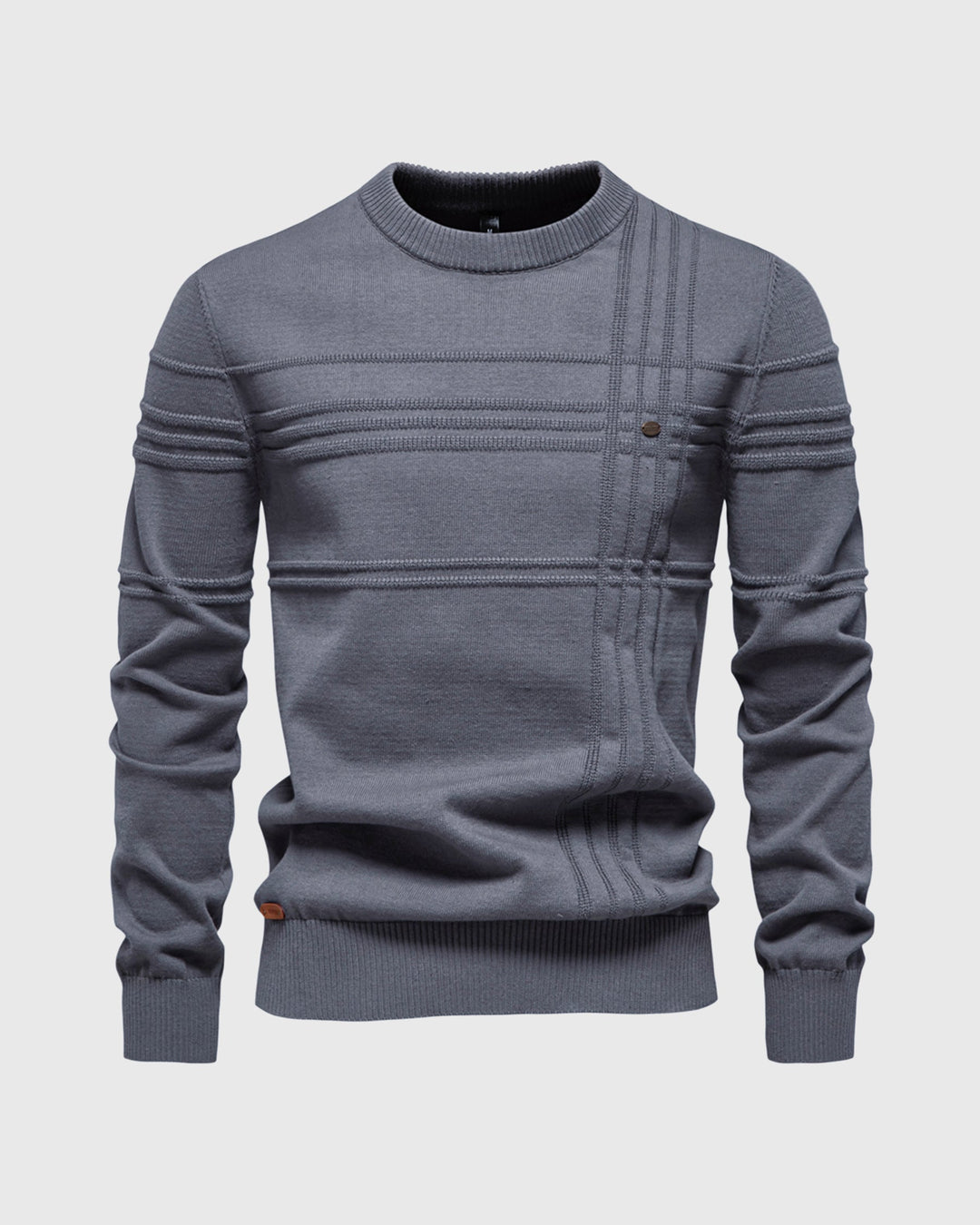 Close-up of the textured knit fabric on a men's everyday crew neck sweater