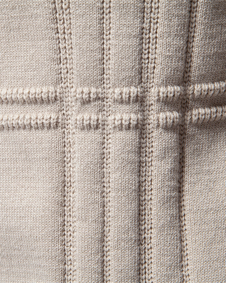 Detail of the shoulder seam on a well-constructed men's crew neck pullover