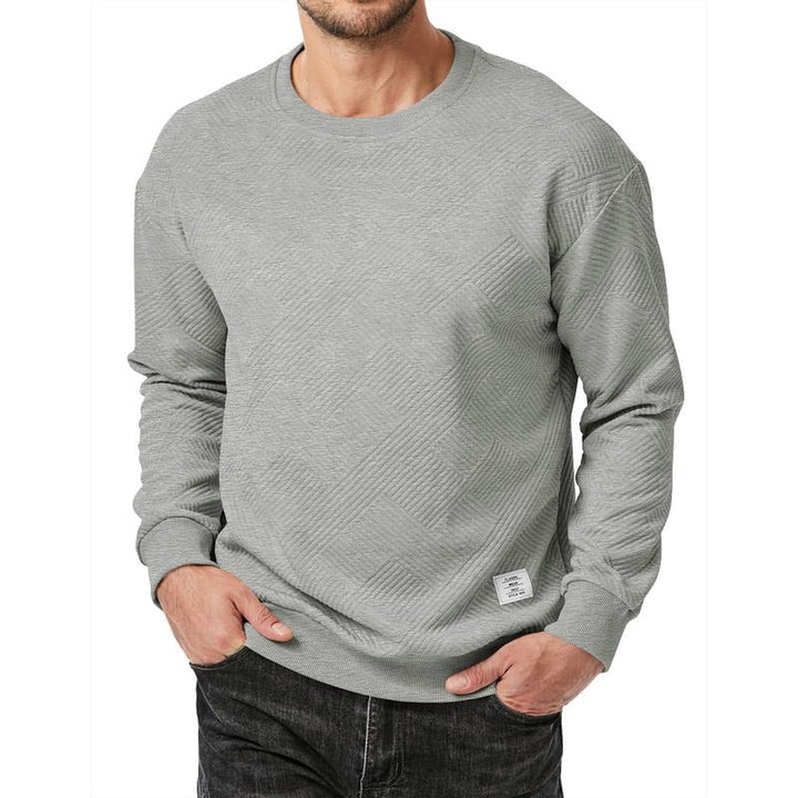 Olive green men's textured knit pullover, a versatile and trendy cotton blend sweater.