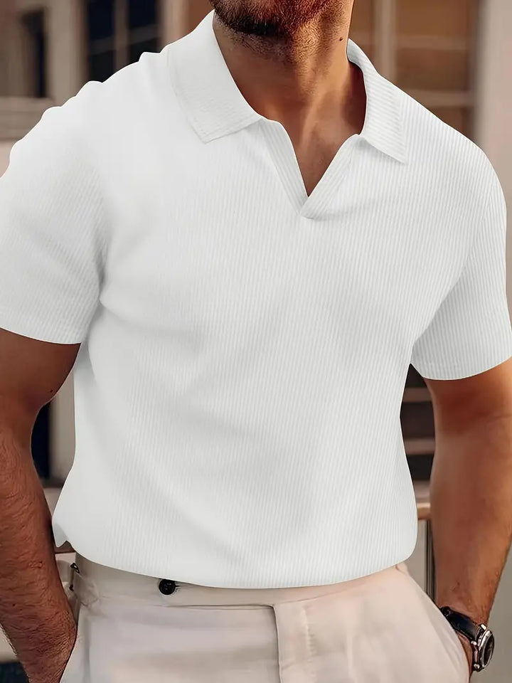 Versatile men's summer polo: textured, slim fit, short sleeve shirt for modern casual wear and men's fashion.