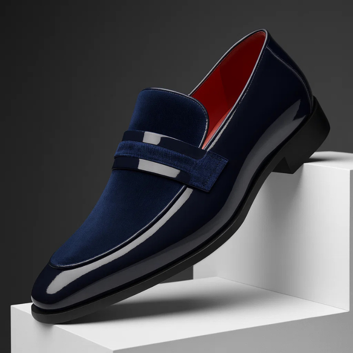 Men's timeless black leather slip-on penny loafers, classic style for casual or dress.