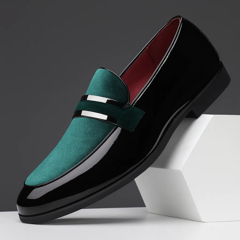 Tan leather men's slip-on penny loafers, showcasing classic timeless design and quality footwear.