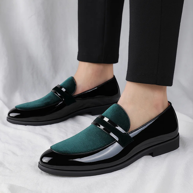 Elegant men's dress slip-on penny loafers, ideal for office or smart casual timeless look.