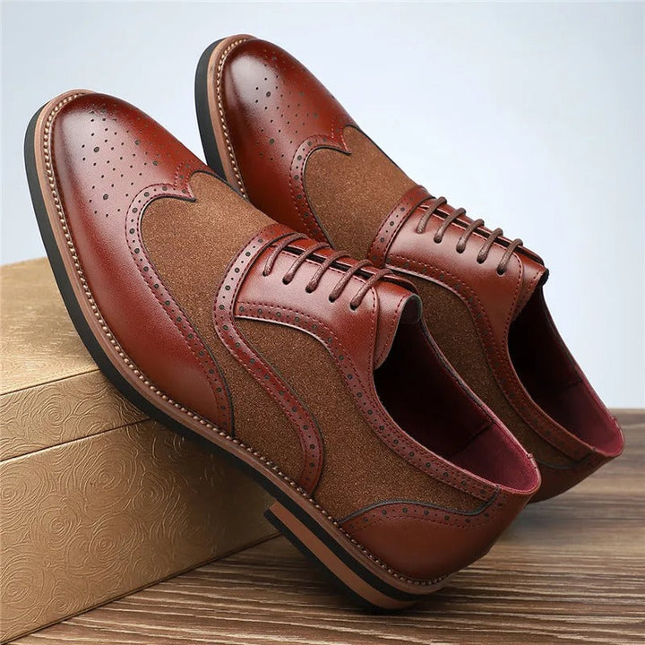 Detail of men's two-tone wingtip brogue oxfords, featuring the wingtip design