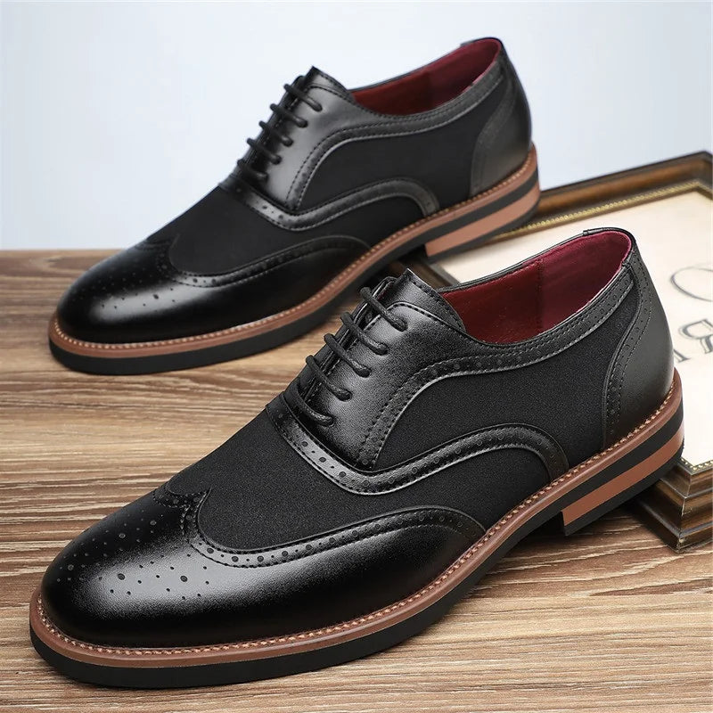 Close-up of men's two-tone wingtip brogue oxfords, showing intricate details
