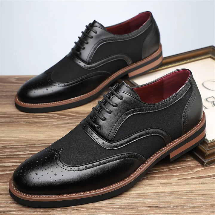 Close-up of men's two-tone wingtip brogue oxfords, showing intricate details