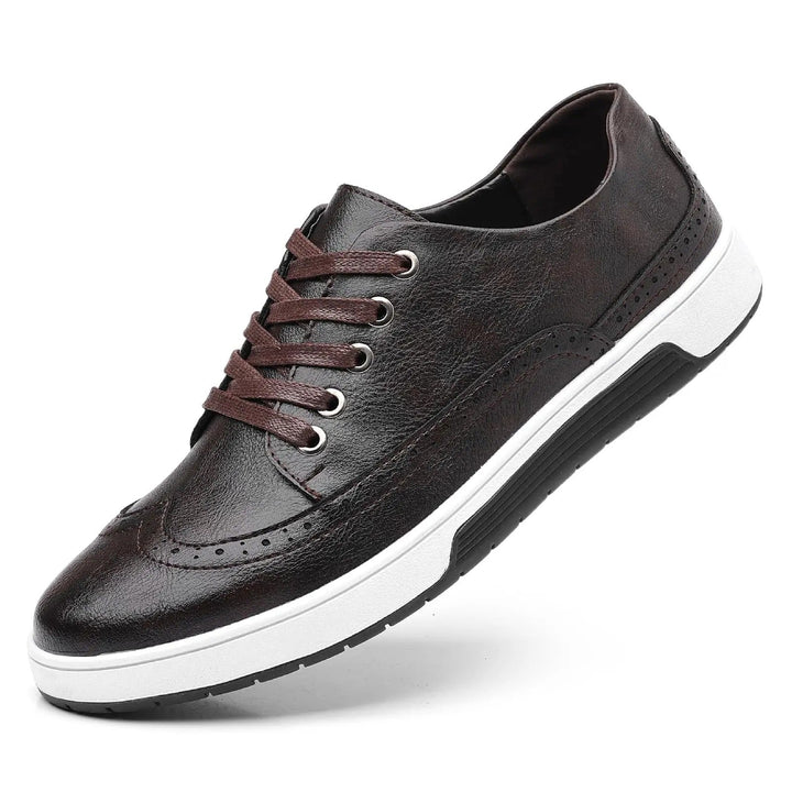 Fashionable men's lightweight sneakers, boasting a leather look and classic brogue accents.