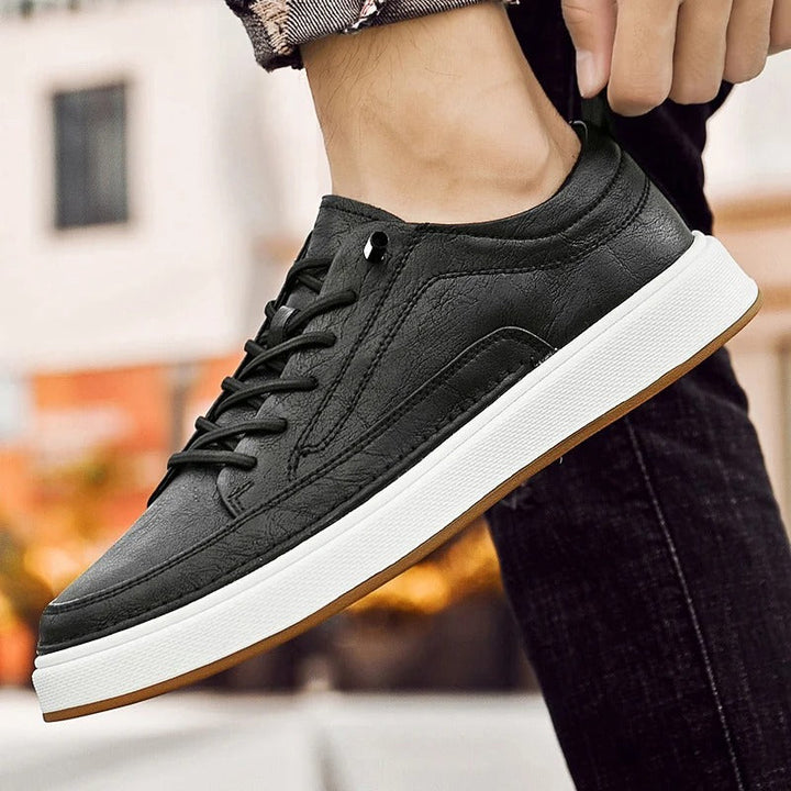Comfort-focused dark brown leather men's sneakers, essential urban style footwear