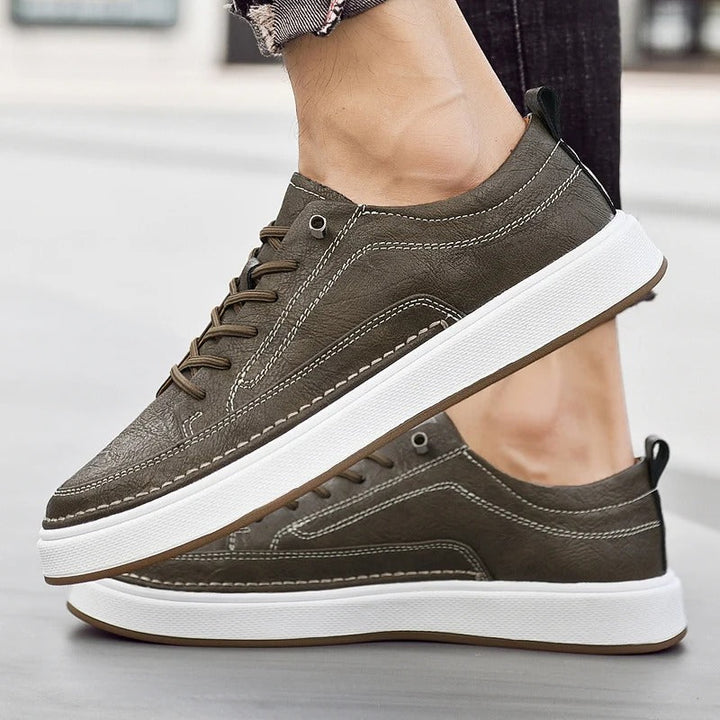 Stylish black men's leather sneakers, perfect urban casual footwear for modern look