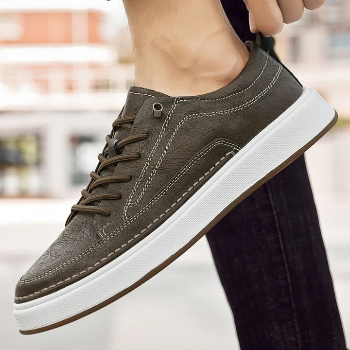 Men's black cowhide leather sneakers, versatile casual footwear for any outfit