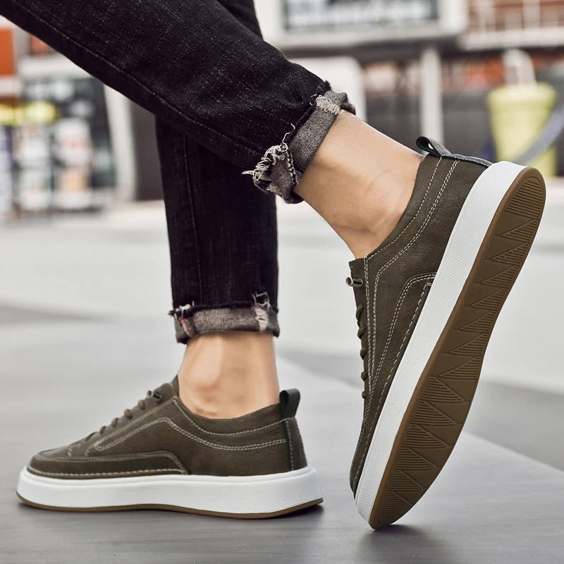 Side view of Men's black leather sneakers, classic and comfortable urban footwear