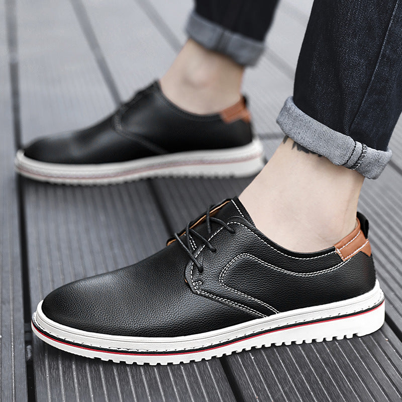 Close-up of men's urban loafers showing intricate lace detail and quality stitching