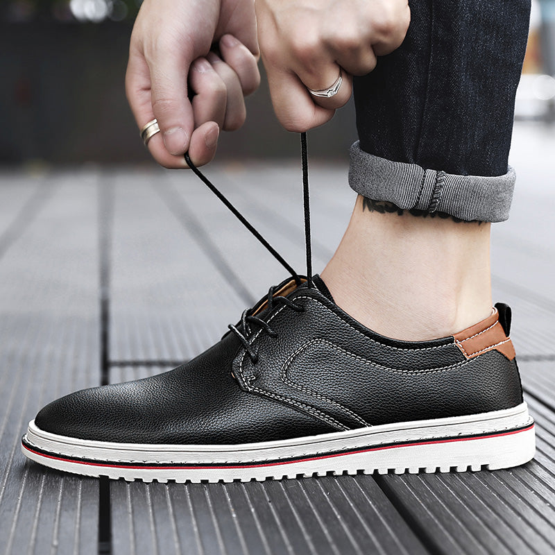 Modern men's urban loafers, dark green, showcasing a contemporary footwear design