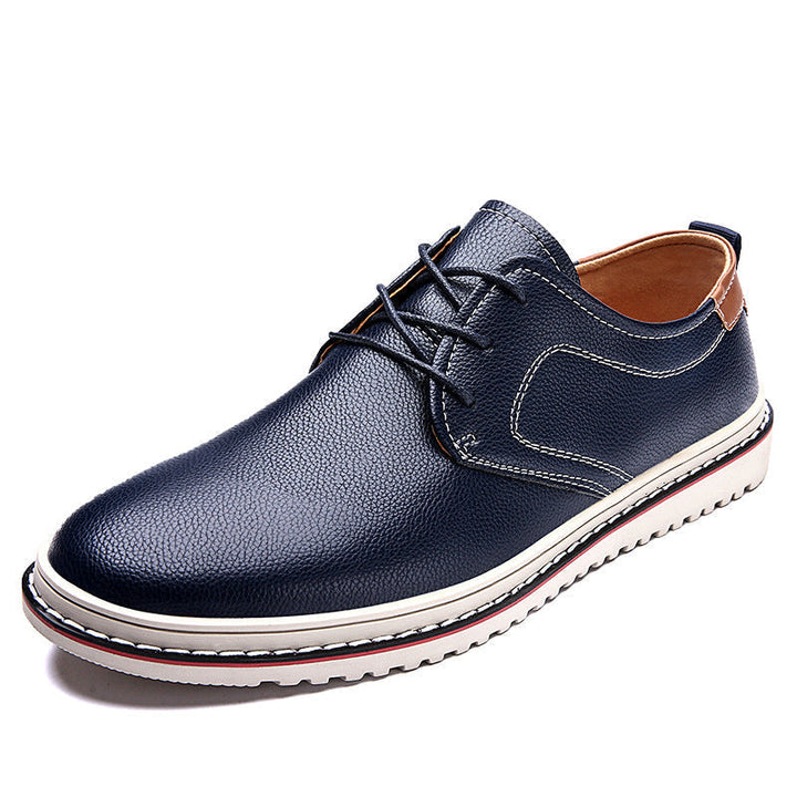 Front view of men's casual urban loafers, gray, ideal for versatile everyday wear