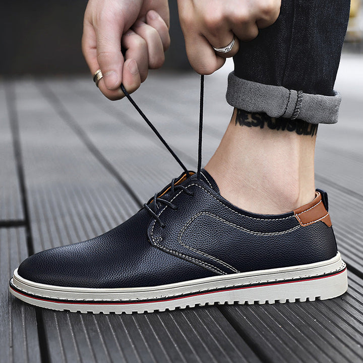 Detailed shot of the laces on men's urban loafers, focusing on texture and craftsmanship