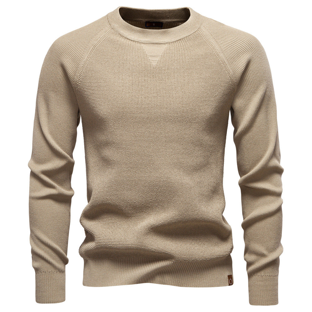 Texture of the viscose blend fabric on a men's waffle knit sweater, soft and warm.