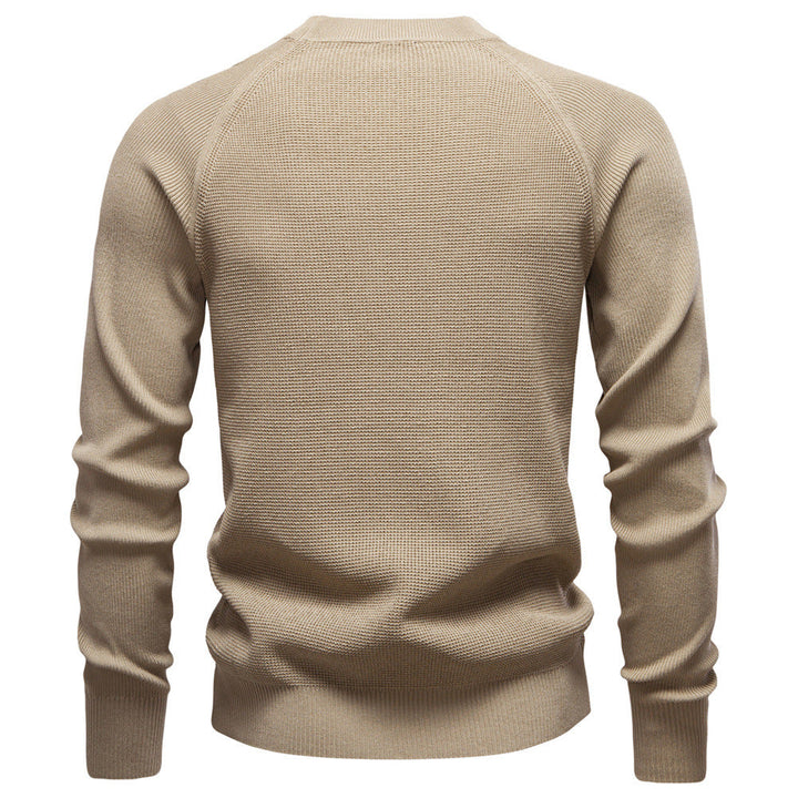 Men's black waffle knit pullover sweater, a timeless piece for any casual wardrobe.