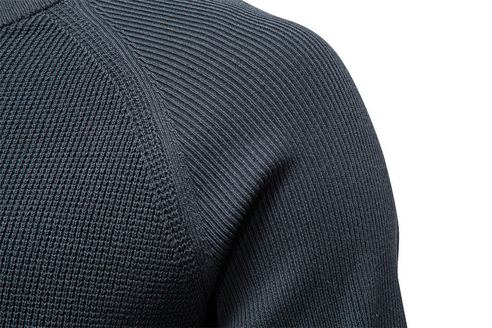 Side profile of a man wearing a men's waffle knit crew neck sweater, comfortable fit.