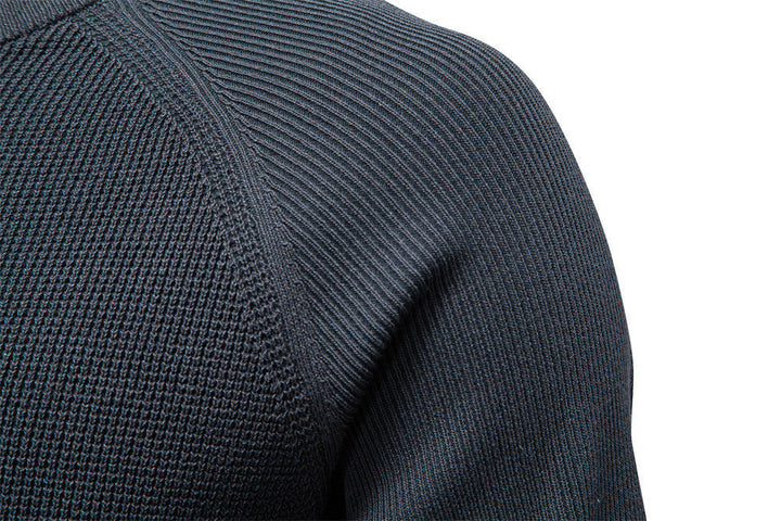 Side profile of a man wearing a men's waffle knit crew neck sweater, comfortable fit.