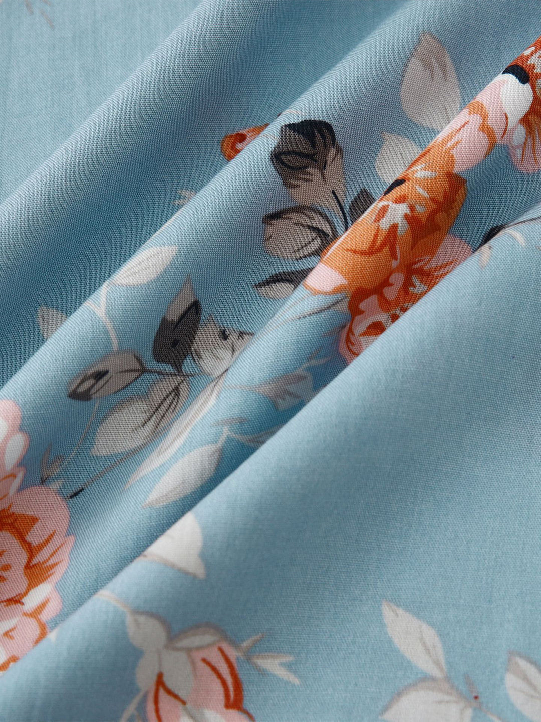 Men's summer floral short sleeve button-down shirt, offering a complete casual look.