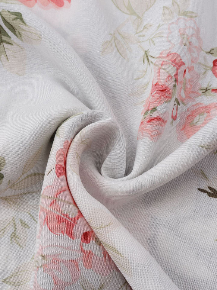 Close-up of the unique floral pattern on a men's short sleeve button-down summer shirt.