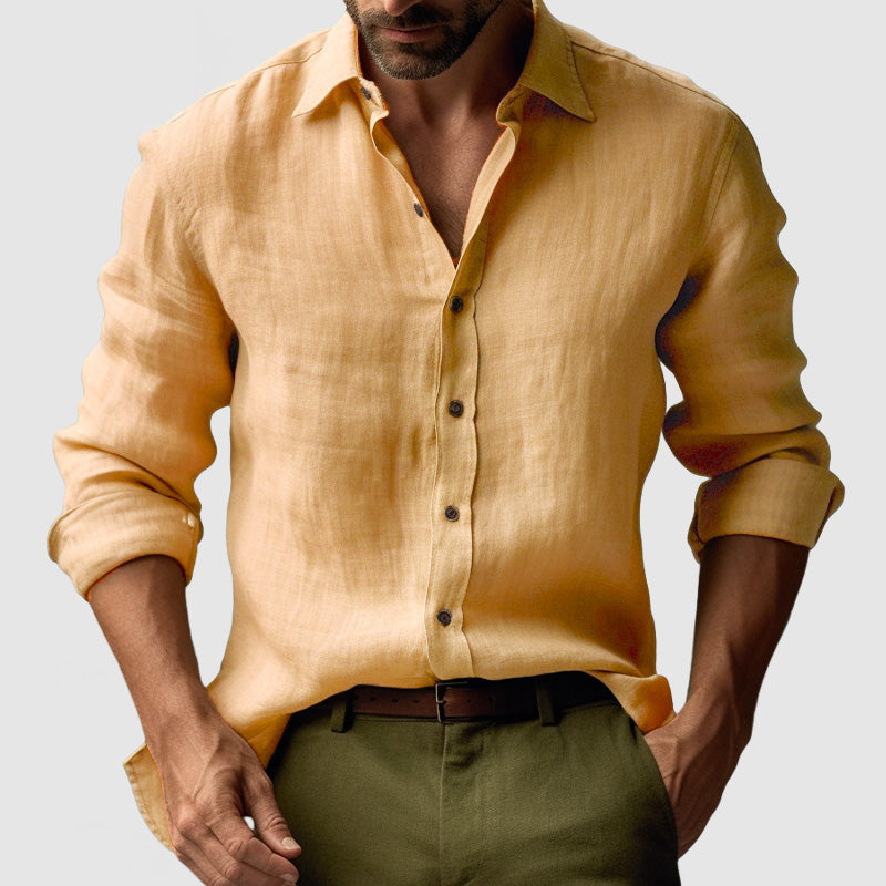 Close-up of men's vintage button-up shirt fabric, highlighting long-sleeve smart-casual design & quality.