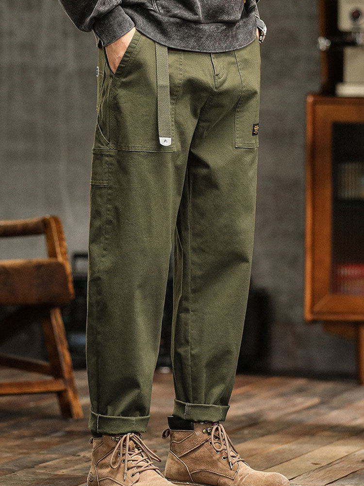 Durable men's vintage utility pants, relaxed fit. Khaki workwear cargo pants, ideal for outdoor adventures.
