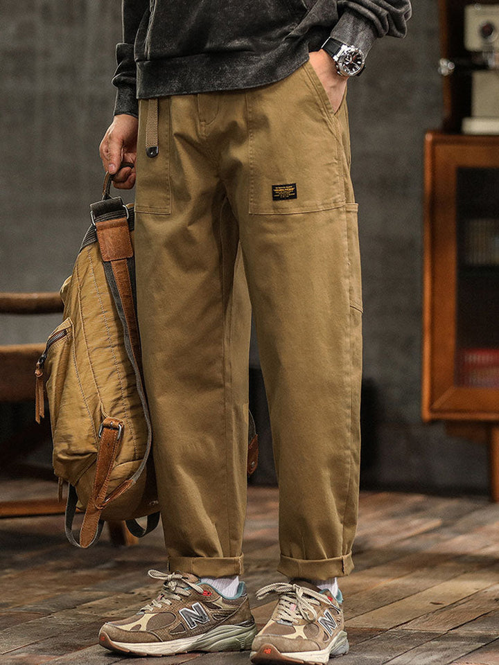 Comfortable men's vintage-style utility pants. Relaxed fit cargo trousers in black, perfect for daily casual wear.