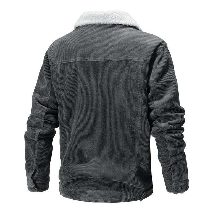 Detail of zipper and ribbed cuffs on men's vintage bomber jacket, quality construction outerwear.
