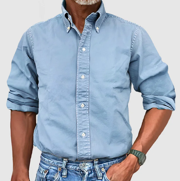 Stylish men's vintage wash button down long sleeve collared shirt. Comfortable fit for modern men's fashion.