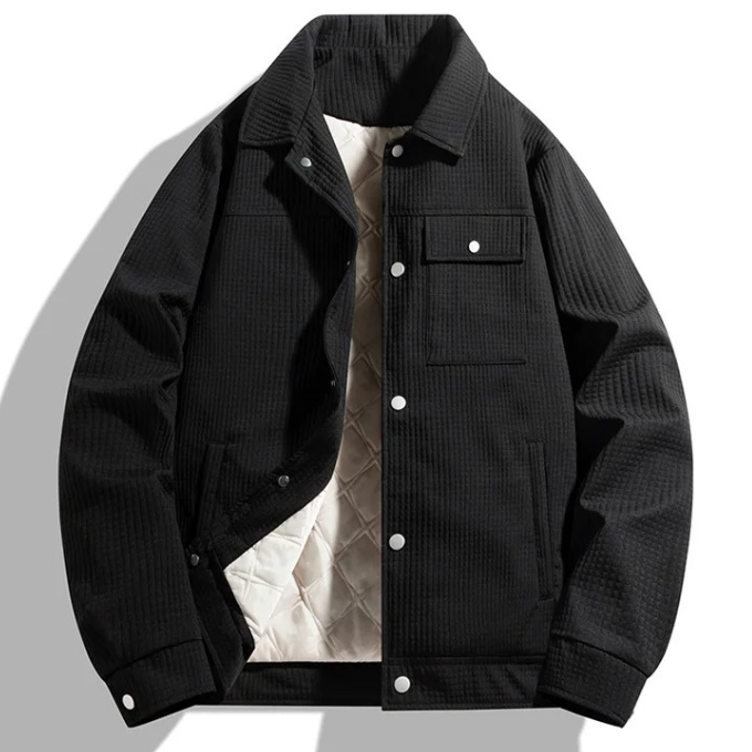 Close-up of a men's waffle knit quilted jacket, showcasing the unique textured fabric for winter.