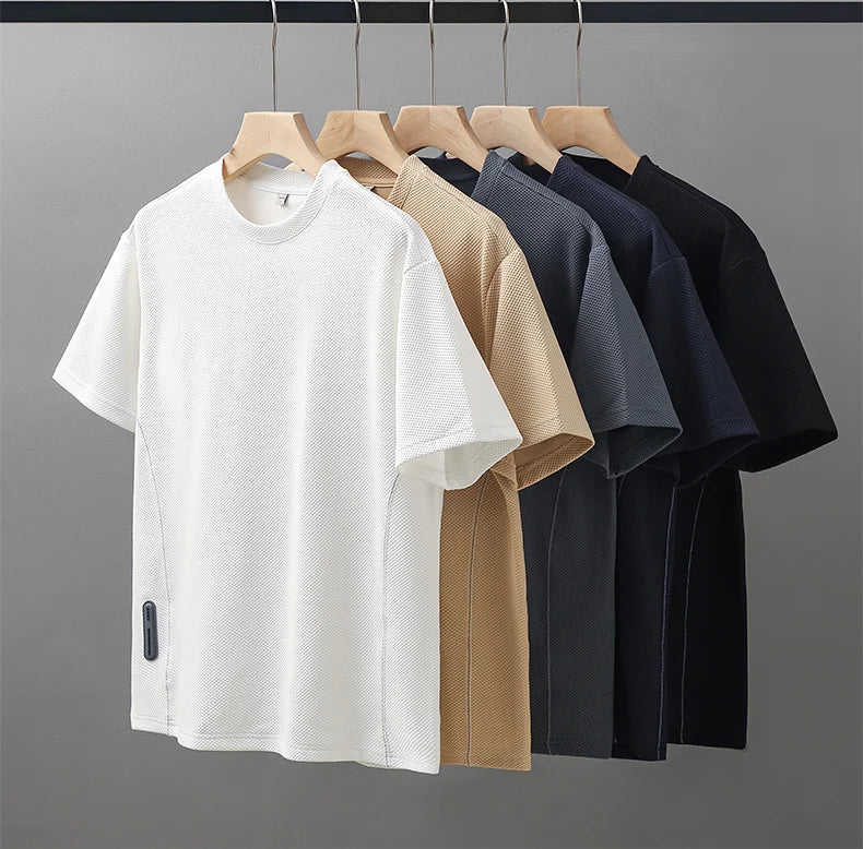 Casual men's waffle texture t-shirt with crew neck. Oversized short sleeve for comfort & modern streetwear look.