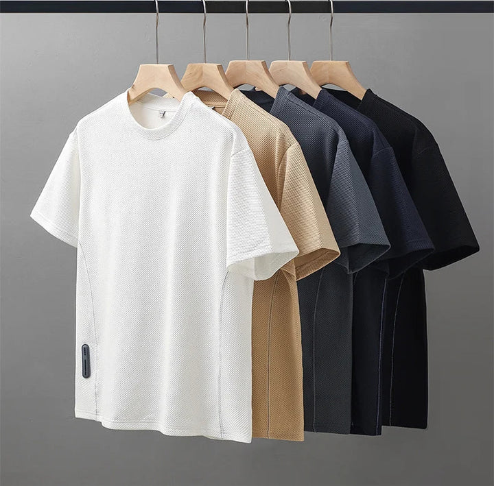 Casual men's waffle texture t-shirt with crew neck. Oversized short sleeve for comfort & modern streetwear look.