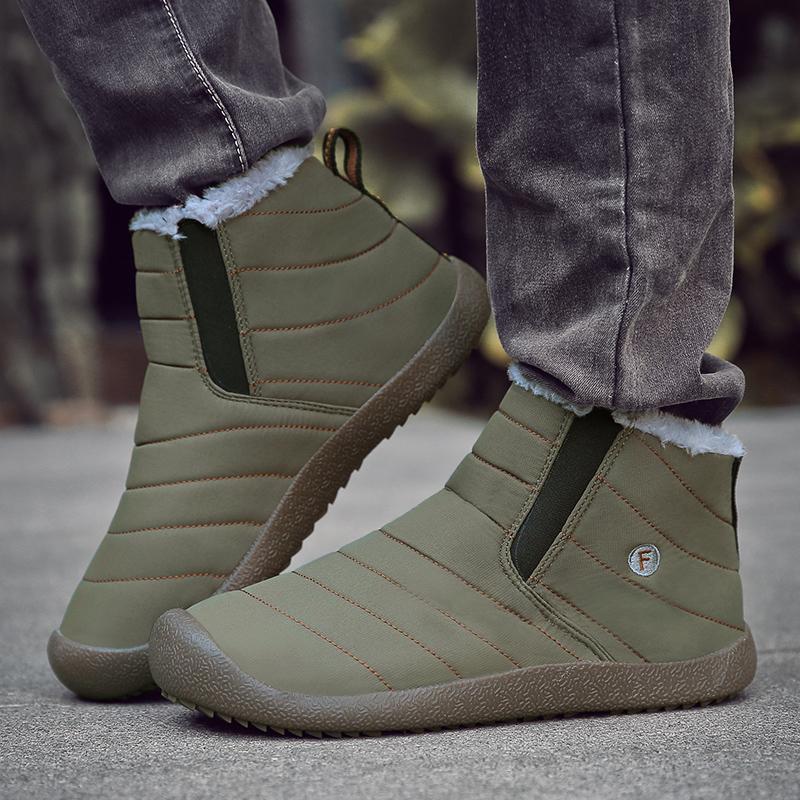 Pair of men's warm snow boots, highlighting ankle height and durable upper material