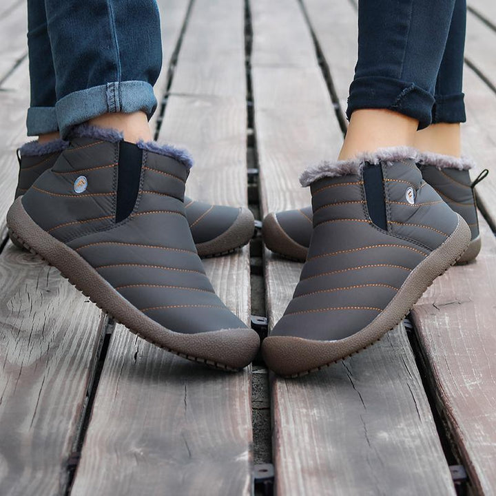 Full view of men's ankle high snow boots, casual yet robust for winter conditions