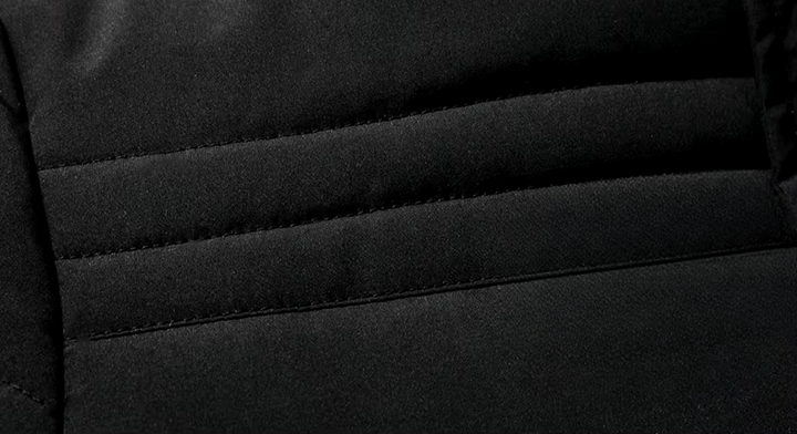 Close-up of the fur lining on a men's warm jacket, highlighting texture and comfort for cold weather.